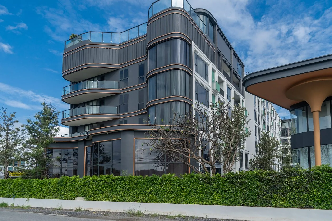 Bellevue Lagoon Phuket — exterior of the completed residential complex in Bang Tao